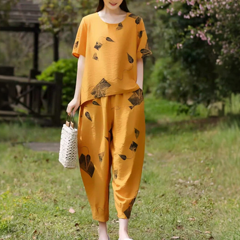 🎉Spring Hot Sale 50% OFF🔥Women's Printed Short-Sleeved Top & Wide-Leg Cropped Pants Set